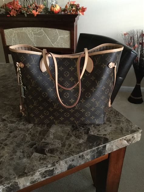 louis vuitton neverfull mm monogram vs damier ebene|louis vuitton damier ebene wristlet.